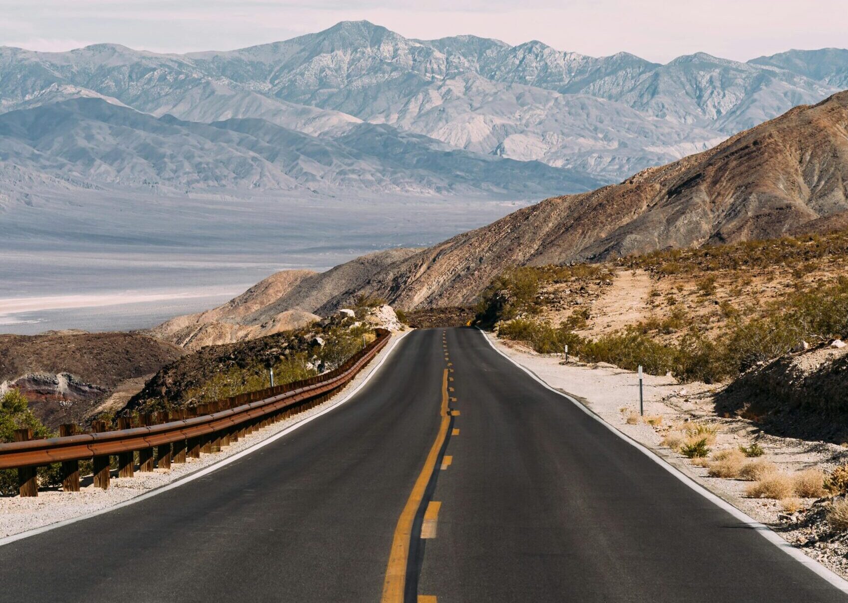 Empty Gray Road Under White Clouds